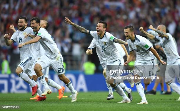 Russia players celebrate following their sides victory in a penalty shoot out during the 2018 FIFA World Cup Russia Round of 16 match between Spain...