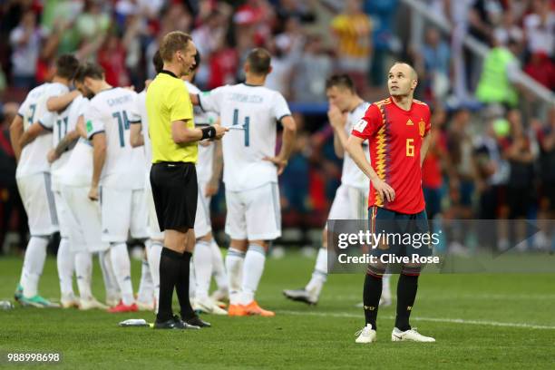 Andres Iniesta of Spain looks dejected following his sides defeat in the 2018 FIFA World Cup Russia Round of 16 match between Spain and Russia at...