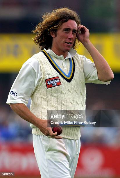 Ryan Sidebottom of Yorkshire takes a break from bowling against Northamptonshire in the CricInfo County Championship match at Headingley, Leeds....