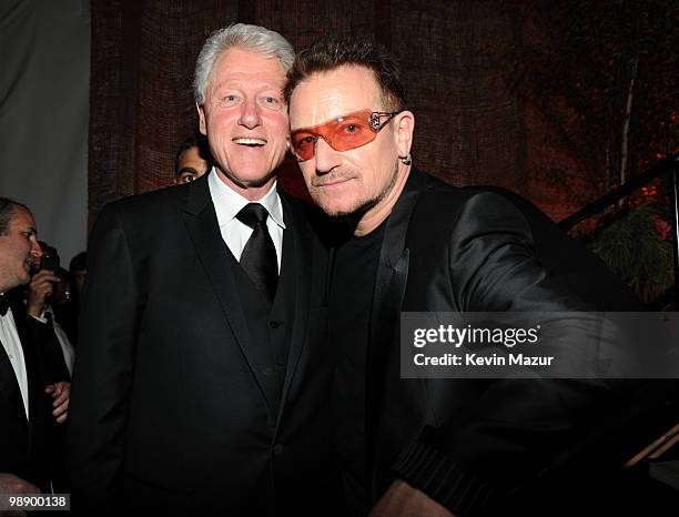 President Bill Clinton and Bono of U2 attend the American Ireland Fund Gala at the Tent at Lincoln Center for the Performing Arts on May 6, 2010 in...