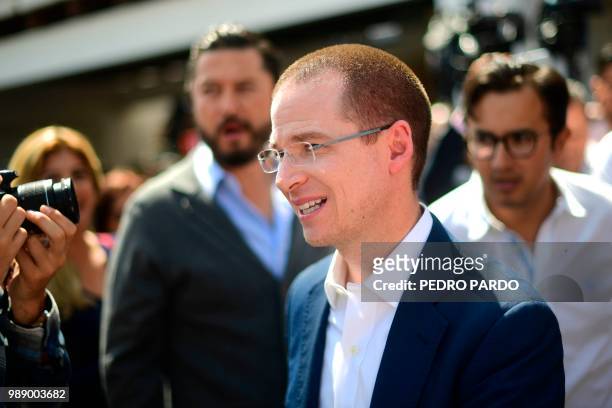 Mexico's presidential candidate Ricardo Anaya for the "Mexico al Frente" coalition party, gestures after voting during general elections, in...