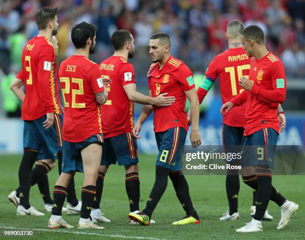 Dani Carvajal of Spain and Koke of Spain look dejected following their sides defeat in the 2018 FIFA World Cup Russia Round of 16 match between Spain...