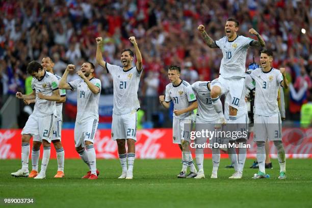 Russia players celebrate their victory following the 2018 FIFA World Cup Russia Round of 16 match between Spain and Russia at Luzhniki Stadium on...