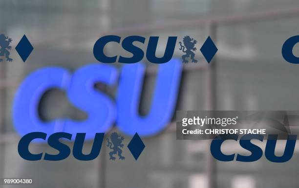 The logo of the Christian Social Union party is seen at the party's headquarter during a leadership meeting of the Bavarian CSU party, sister of the...