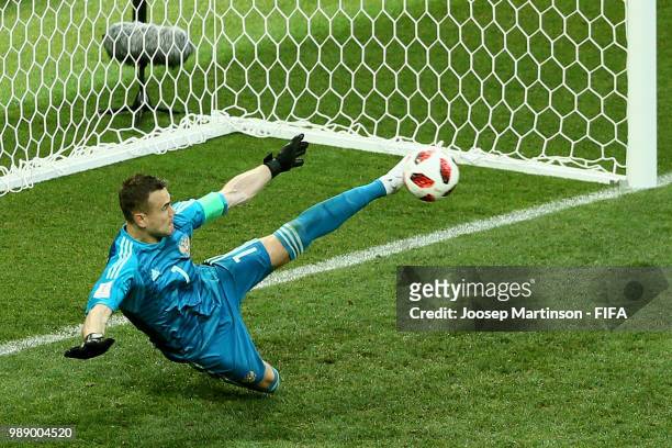 Igor Akinfeev of Russia saves the fifth penalty from Iago Aspas of Spain in the penalty shoot out during the 2018 FIFA World Cup Russia Round of 16...