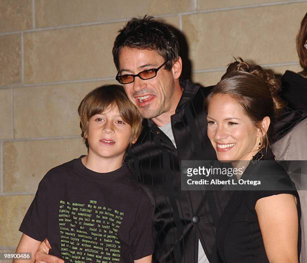 Robert Downey Jr., Susan Levin, son and guest