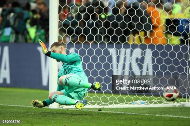 David De Gea of Spain fails to stop the penalty of Aleksandr Golovin of Russia during a penalty shootout during the 2018 FIFA World Cup Russia Round...