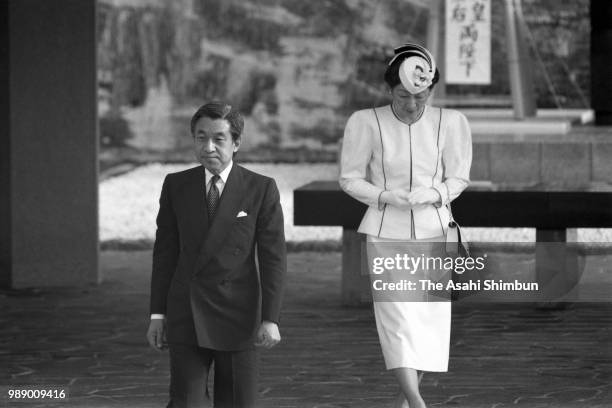 Crown Prince Akihito and Crown Princess Michiko are seen after praying for the victims of the Battle of Okinawa at Okinawa Peace Memorial Park on...