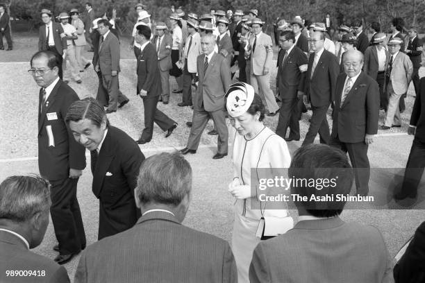 Crown Prince Akihito and Crown Princess Michiko are seen after praying for the victims of the Battle of Okinawa at Okinawa Peace Memorial Park on...