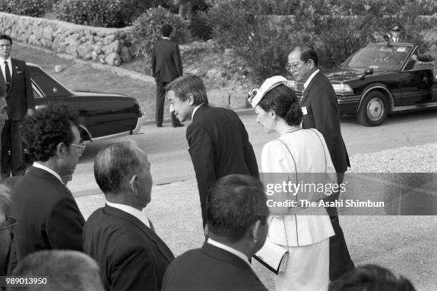 Crown Prince Akihito and Crown Princess Michiko are seen after praying for the victims of the Battle of Okinawa at Okinawa Peace Memorial Park on...