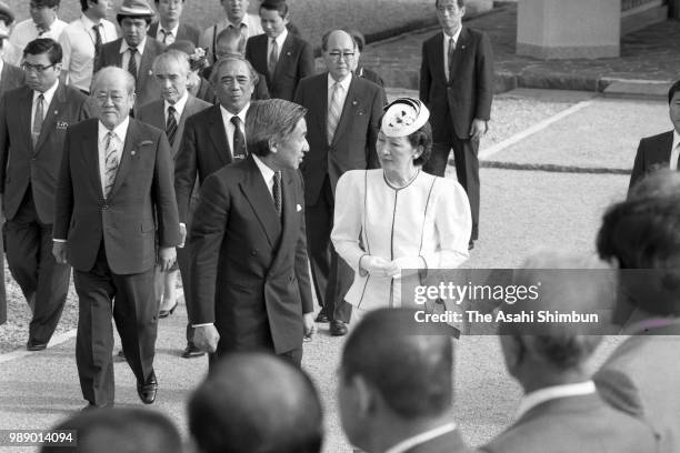 Crown Prince Akihito and Crown Princess Michiko are seen after praying for the victims of the Battle of Okinawa at Okinawa Peace Memorial Park on...