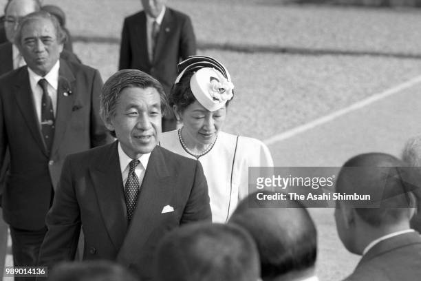 Crown Prince Akihito and Crown Princess Michiko are seen after praying for the victims of the Battle of Okinawa at Okinawa Peace Memorial Park on...