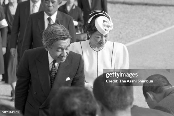 Crown Prince Akihito and Crown Princess Michiko are seen after praying for the victims of the Battle of Okinawa at Okinawa Peace Memorial Park on...