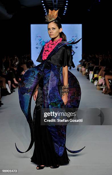 Model showcases designs on the catwalk by Khrysalis during the New Generation collection show on the fifth and final day of Rosemount Australian...