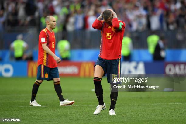 Sergio Ramos of Spain looks dejected following his sides defeat in the 2018 FIFA World Cup Russia Round of 16 match between Spain and Russia at...