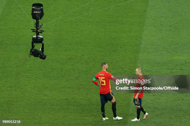 Spidercam watches as Sergio Ramos of Spain comforts a tearful Andres Iniesta of Spain after they are knocked out of the tournament on penalties...