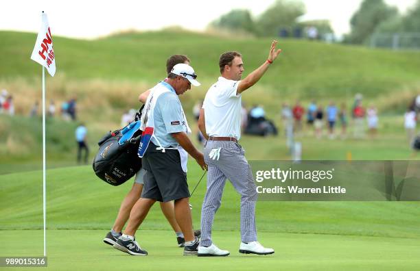 Justin Thomas of The USA waves to the crowd on the 18th hole during day four of the HNA Open de France at Le Golf National on July 1, 2018 in Paris,...