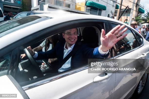 Mexico's presidential candidate Ricardo Anaya for the "Mexico al Frente" coalition party, waves after voting during general elections, in Queretaro,...