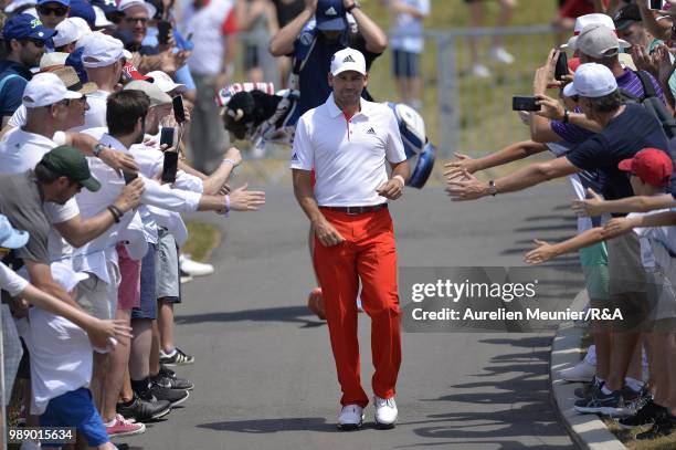 Sergio Garcia of Spain reacts as he arrives on the first tee during The Open Qualifying Series part of the HNA Open de France at Le Golf National on...