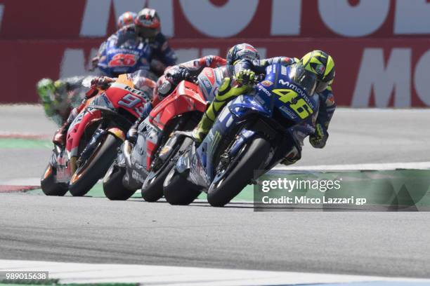 Valentino Rossi of Italy and Movistar Yamaha MotoGP leads the field during the MotoGp race during the MotoGP Netherlands - Race on July 1, 2018 in...