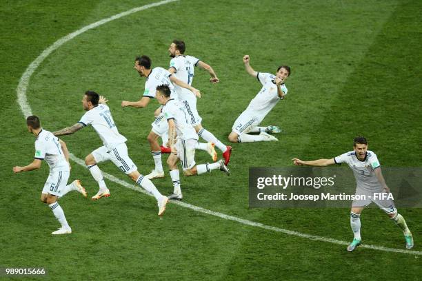 Russia player celebrates victory following the 2018 FIFA World Cup Russia Round of 16 match between Spain and Russia at Luzhniki Stadium on July 1,...