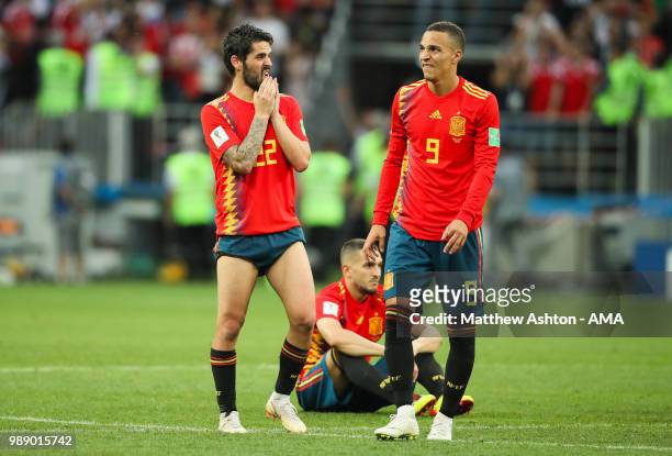 Isco of Spain and Rodrigo of Spain look dejected after their team were eliminated during a penalty shootout during the 2018 FIFA World Cup Russia...