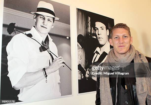 German football player Bastian Schweinsteiger attends the Strenesse book presentation 'Die Spieler' by German photographer Ellen von Unwerth on May...