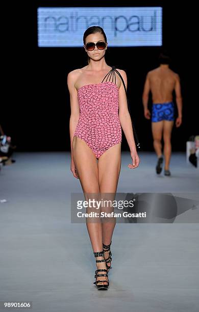 Model showcases designs on the catwalk by Nathanpaul Swimwear during the New Generation collection show on the fifth and final day of Rosemount...