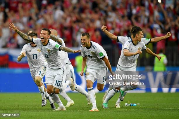 Russia players celebrate victory following the 2018 FIFA World Cup Russia Round of 16 match between Spain and Russia at Luzhniki Stadium on July 1,...