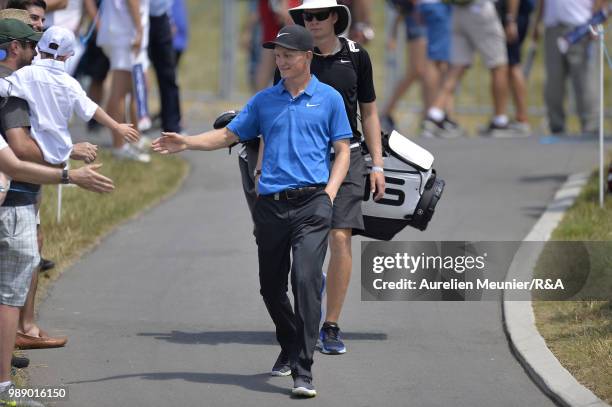 Marcus Kinhult of Sweden reacts as he arrives on the first tee during The Open Qualifying Series part of the HNA Open de France at Le Golf National...