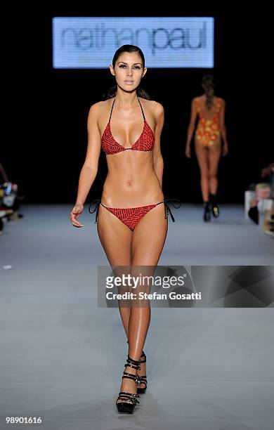 Model showcases designs on the catwalk by Nathanpaul Swimwear during the New Generation collection show on the fifth and final day of Rosemount...
