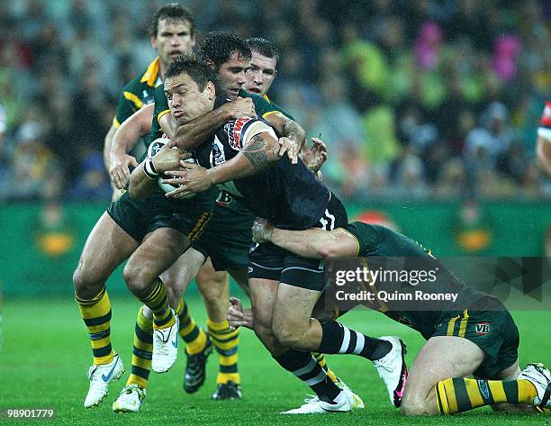 Jared Waerea-Hargreaves of the Kiwis is tackled by Cameron Smith of the kangaroos during the ARL Test match between the Australian Kangaroos and the...