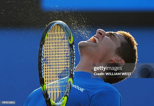 Nicolas Almagro of Spain celebrates winning match point against Alejandro Falla of Colombia in their men's singles third round match on day six of...