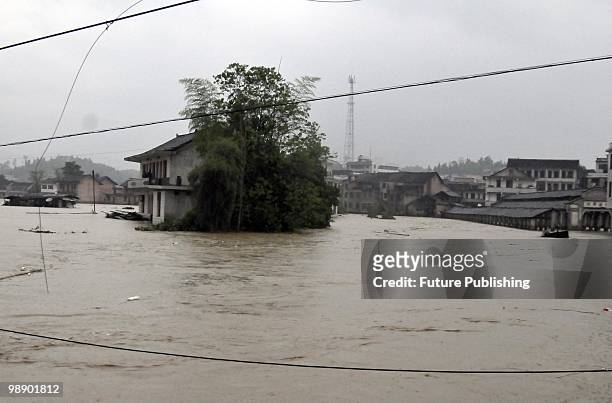 Flooded house on May 6 in Shuiche township, Xinhua county, Hunan province, China. At least 55 have been killed in the floods which were triggered by...