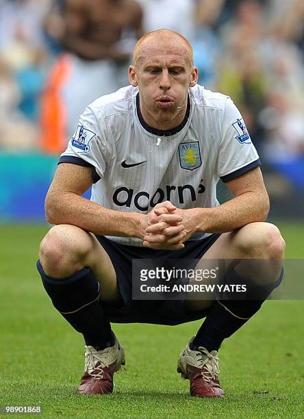 Aston Villa's Welsh defender James Collins reacts at the final whistle after his team were beaten 3-1in the English Premier League football match...