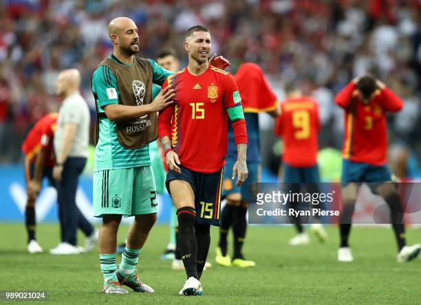 Pepe Reina of Spain and Sergio Ramos of Spain look dejected following their sides defeat in the 2018 FIFA World Cup Russia Round of 16 match between...