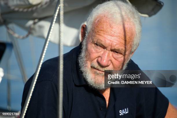 Britain's Sir Robin Knox-Johnston, the winner of the first ever Golden Globe Race poses for a picture in Les Sables d'Olonne Harbour on July 1 at the...