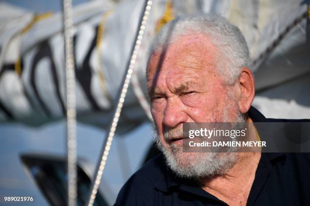 Britain's Sir Robin Knox-Johnston, the winner of the first ever Golden Globe Race poses for a picture in Les Sables d'Olonne Harbour on July 1 at the...