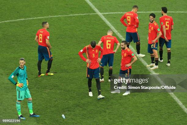 Detected Spain console one another after they are knocked out of the tournament on penalties during the 2018 FIFA World Cup Russia Round of 16 match...