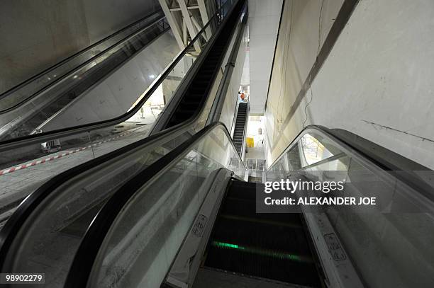 Escalators are pictured at Sandton station built for the Gautrain, South Africa's first high-speed train, in Johannesburg on May 6, 2010. The line...