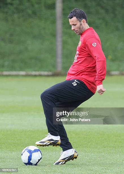 Ryan Giggs of Manchester United in action during a First Team Training Session at Carrington Training Ground on May 7 2010 in Manchester, England.