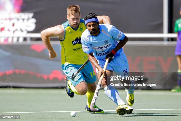 Aaron Kleinschmidt of Australia, Birendra Lakra of India during the Champions Trophy match between Australia v India at the Hockeyclub Breda on July...