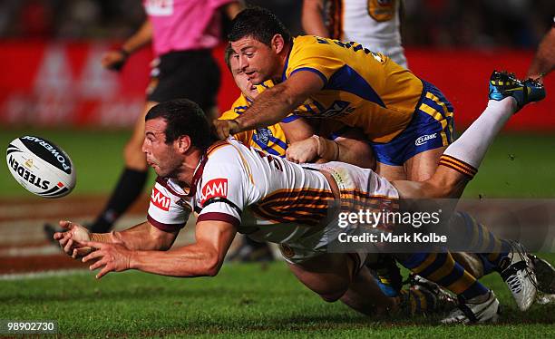 Anthony Laffranchi of Country gets a pass away as he is tackled during the ARL Origin match between Country and City at Regional Sports Stadium on...