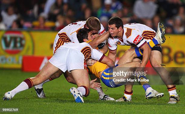 Anothony Minichello of City is tackled during the ARL Origin match between Country and City at Regional Sports Stadium on May 7, 2010 in Port...