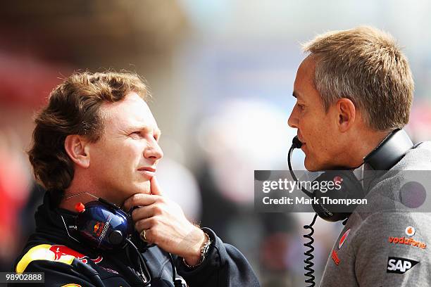 Red Bull Racing Team Principal Christian Horner talks with McLaren Mercedes Team Principal Martin Whitmarsh during practice for the Spanish Formula...