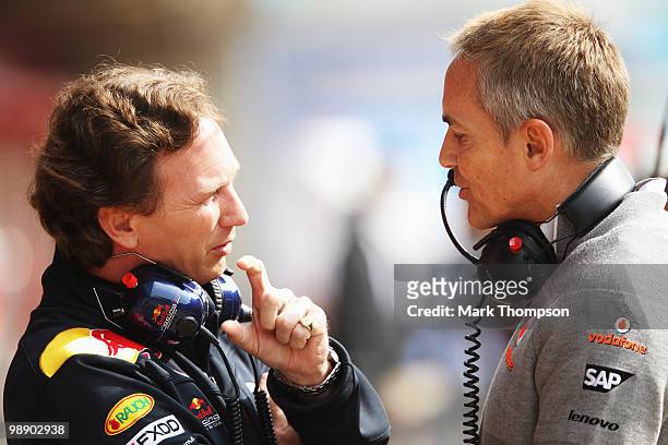 Red Bull Racing Team Principal Christian Horner talks with McLaren Mercedes Team Principal Martin Whitmarsh during practice for the Spanish Formula...