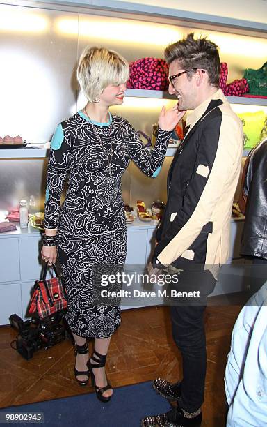 Henry Holland and Pixie Geldof attend the Teen Vogue Handbook UK launch at Marc Jacobs Boutique on May 6, 2010 in London,England.