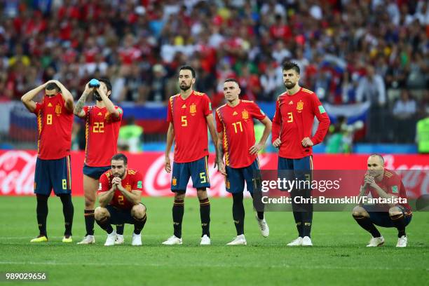 Spain react during the penalty shoot-out following 2018 FIFA World Cup Russia Round of 16 match between Spain and Russia at Luzhniki Stadium on July...