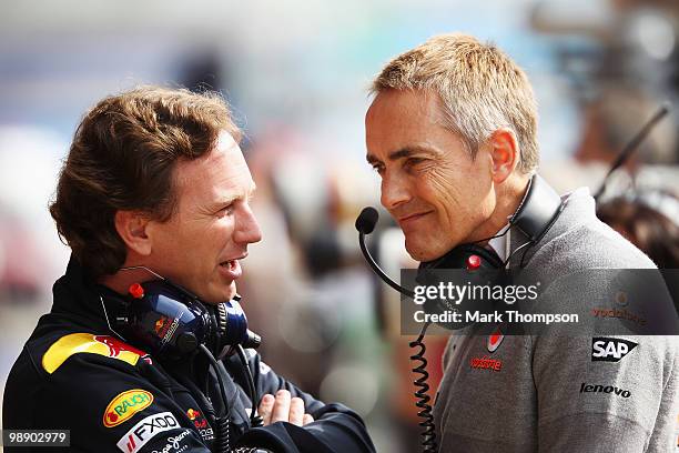 Red Bull Racing Team Principal Christian Horner talks with McLaren Mercedes Team Principal Martin Whitmarsh during practice for the Spanish Formula...