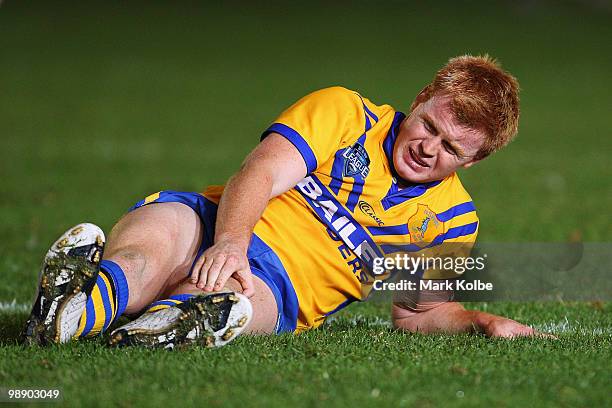 Kris Keating of City holds his knee after injuring it during the ARL Origin match between Country and City at Regional Sports Stadium on May 7, 2010...
